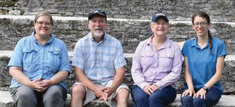 Yaeger and Brown (center) flanked by project Associate Directors, Bernadette Cap (left) and Rachel Horowitz (right) on the stairs of the main acropolis at the Maya site of Xunantunich, Belize.