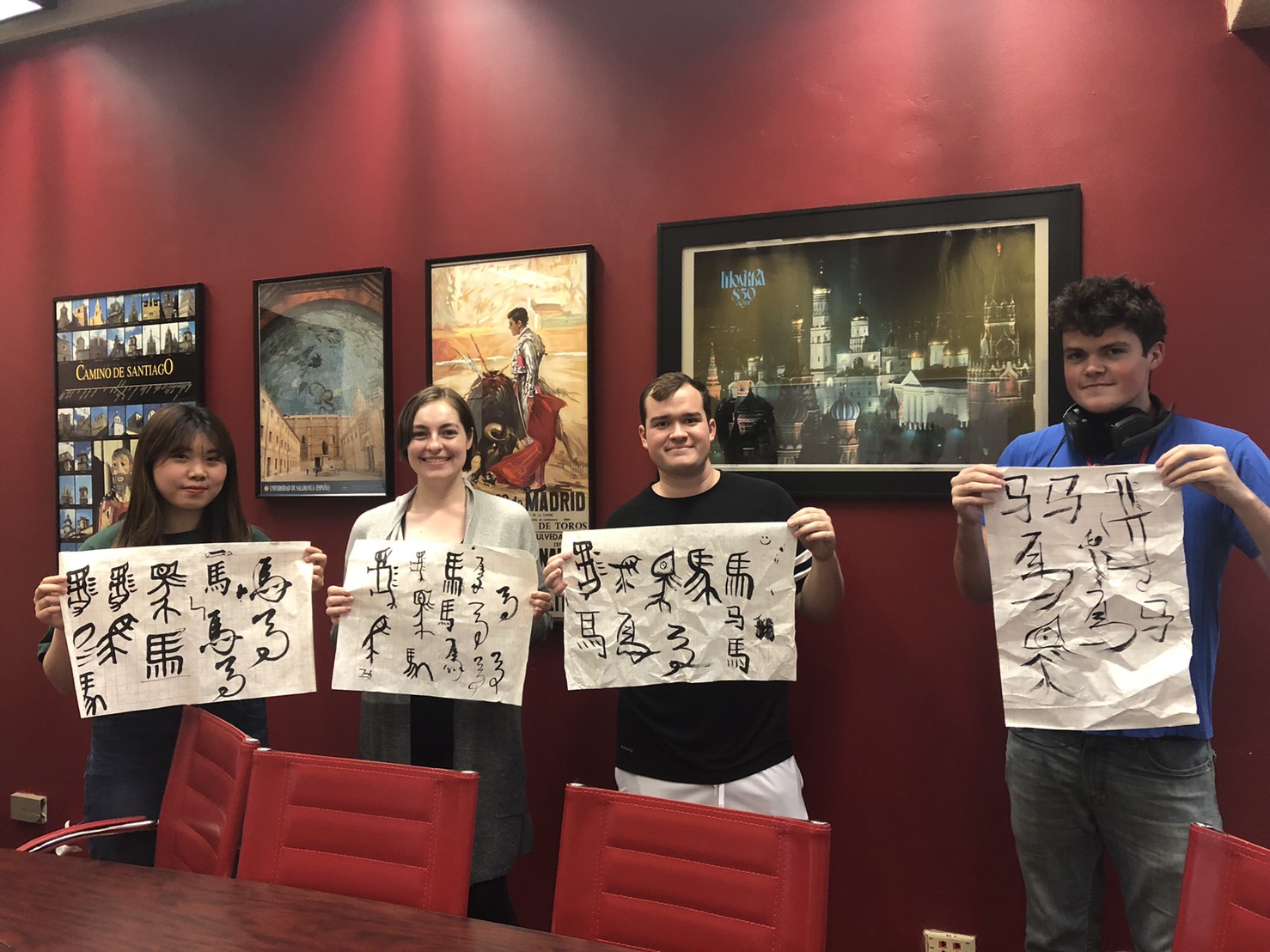 Chinese Language and Culture Club holding papers