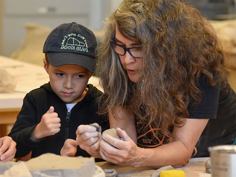 instructor with young student