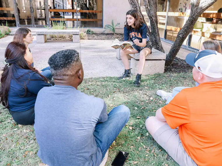 Student in a reading circle 