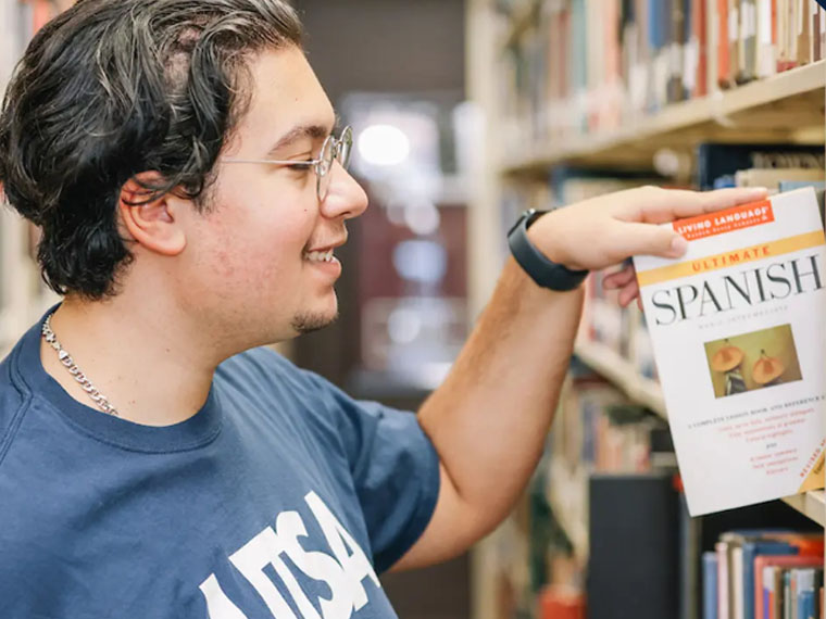Student with Spanish book