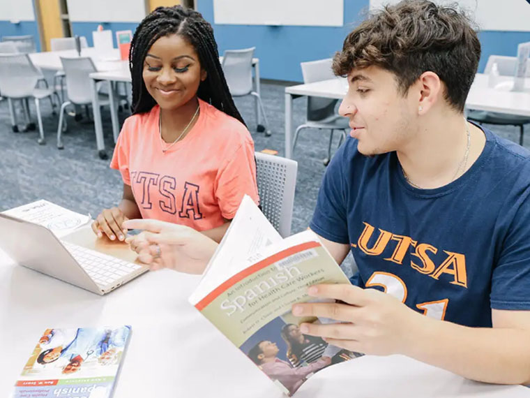 Students with Spanish book