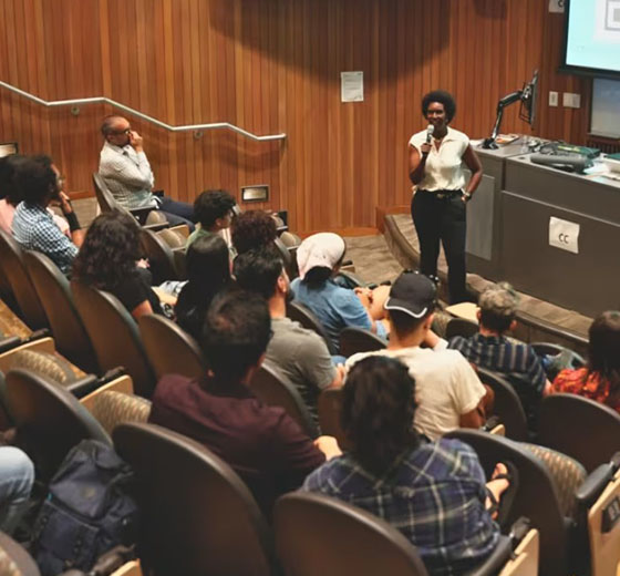 Monique Walton, a producer on the film 'Sing Sing,' speaks to attendees at last Wednesday's screening. (Courtesy of Taylor Tetteh)
